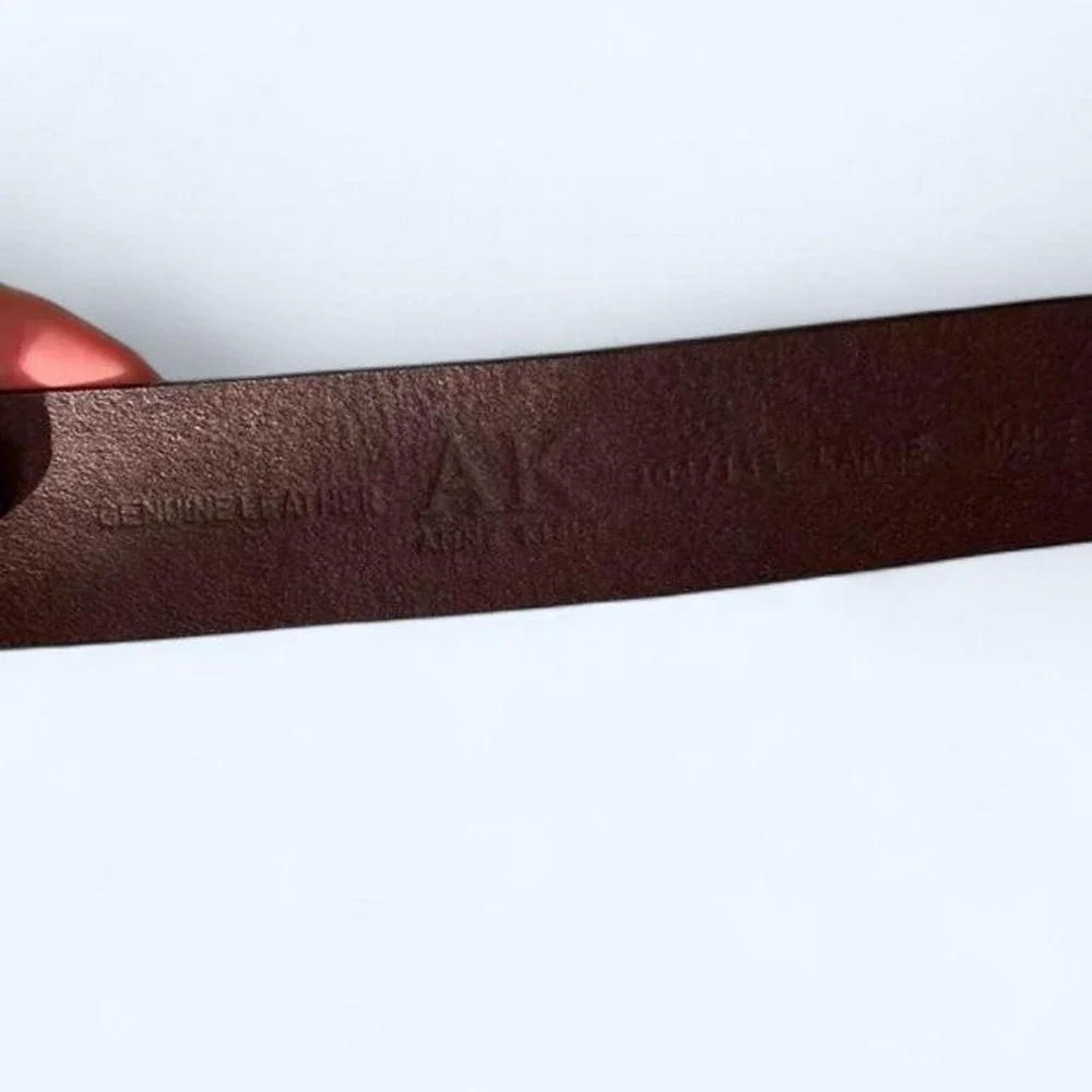 Brown leather belt with silver embossed buckle size L by‎ Ann Klein